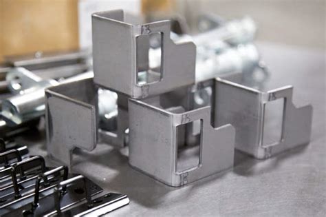 fabricated metal components for material handling|Material Handling Fabrication and Stamping .